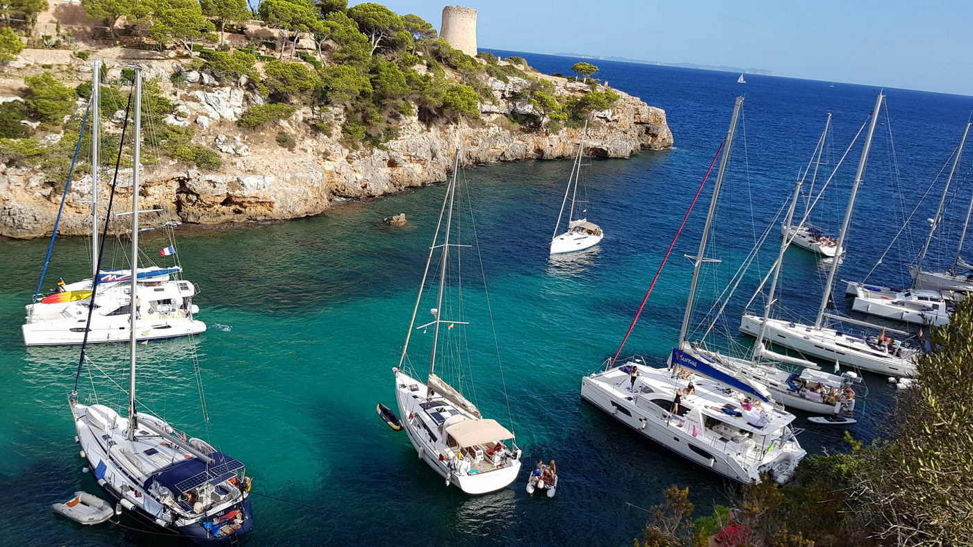 CalaPi bay with sailimg boats.jpg