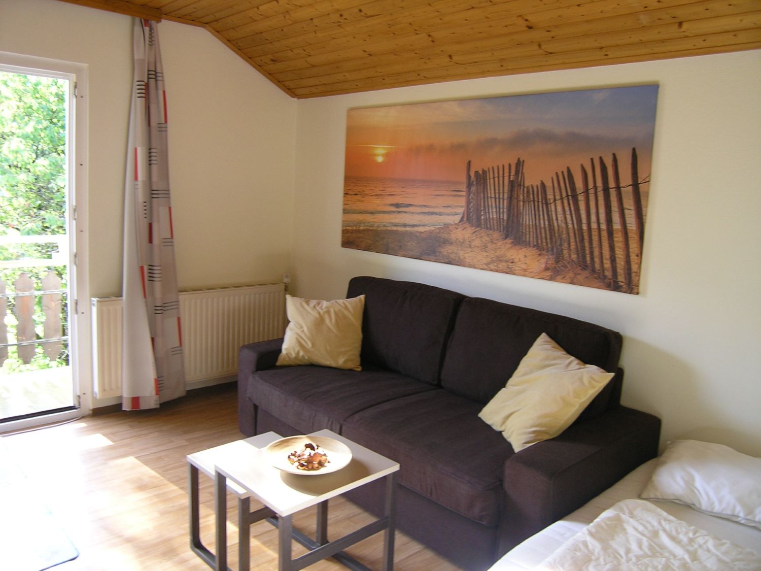 Wohnzimmer mit Aussicht in der Ferienwohnung Mountain View 2 in Pyhrn Priel Region.JPG