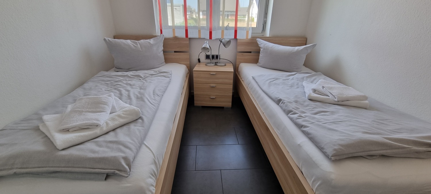 10Galerie - Schlafzimmer Einzelbetten.jpg