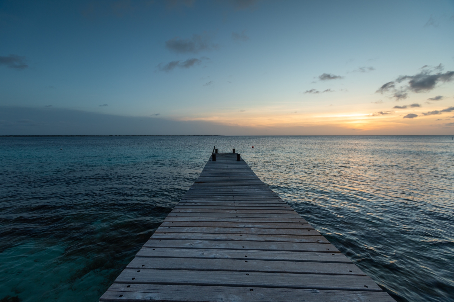 pier-leading-breathtaking-sunset-reflecting-ocean-bonaire-caribbean.jpg