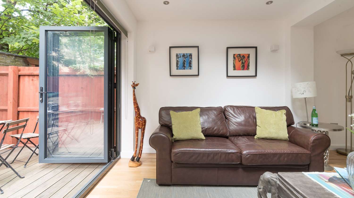 Entertainment room tri folding french doors open.jpg