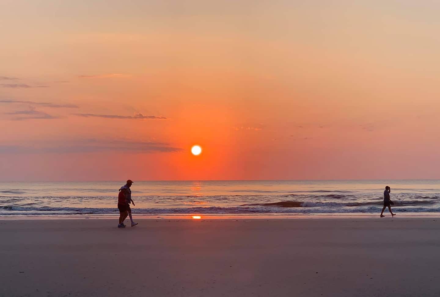 Sunrise walk on beach.jpeg