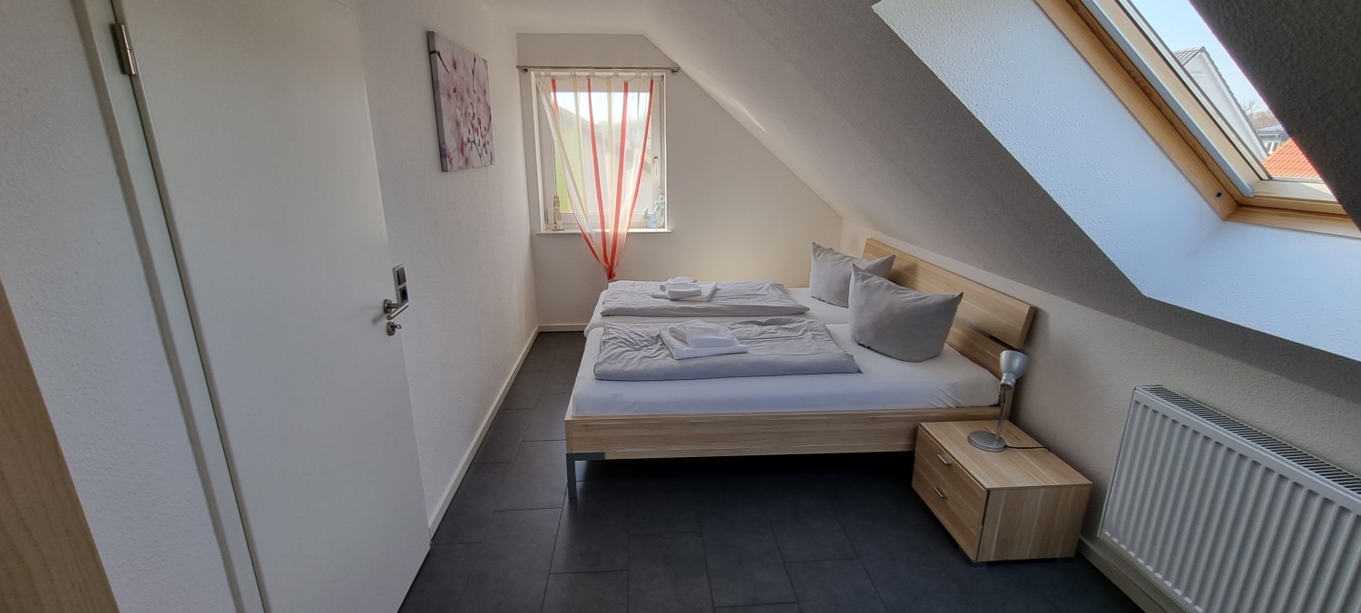 18Galerie - 2. Schlafzimmer OG.jpg