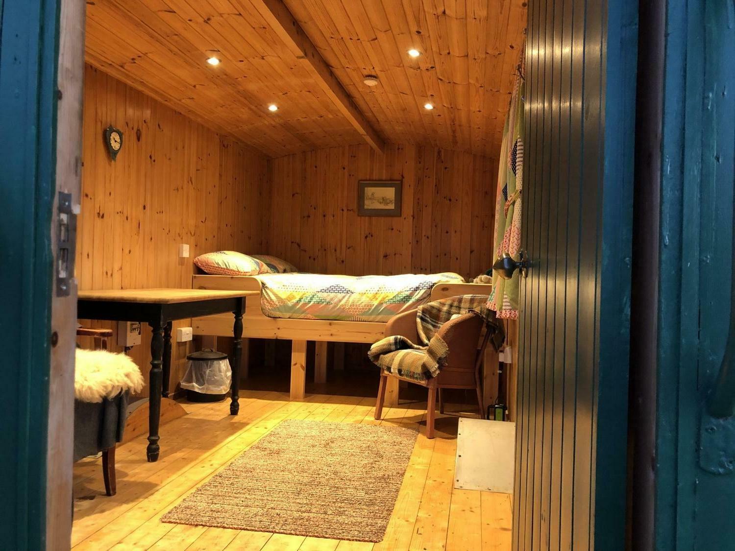 Bothy with evening lights.jpg