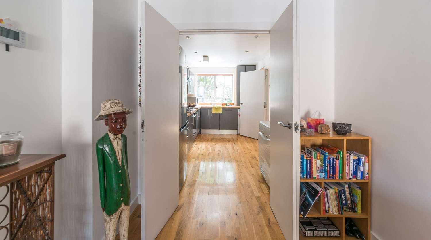L1 View livingroom into kitchen.jpg