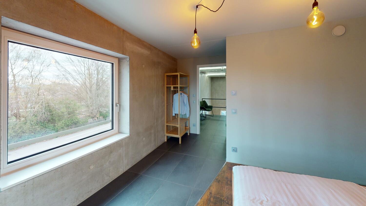 Skyline-Atelier-im-Sichtbeton-Bedroom 1.jpg