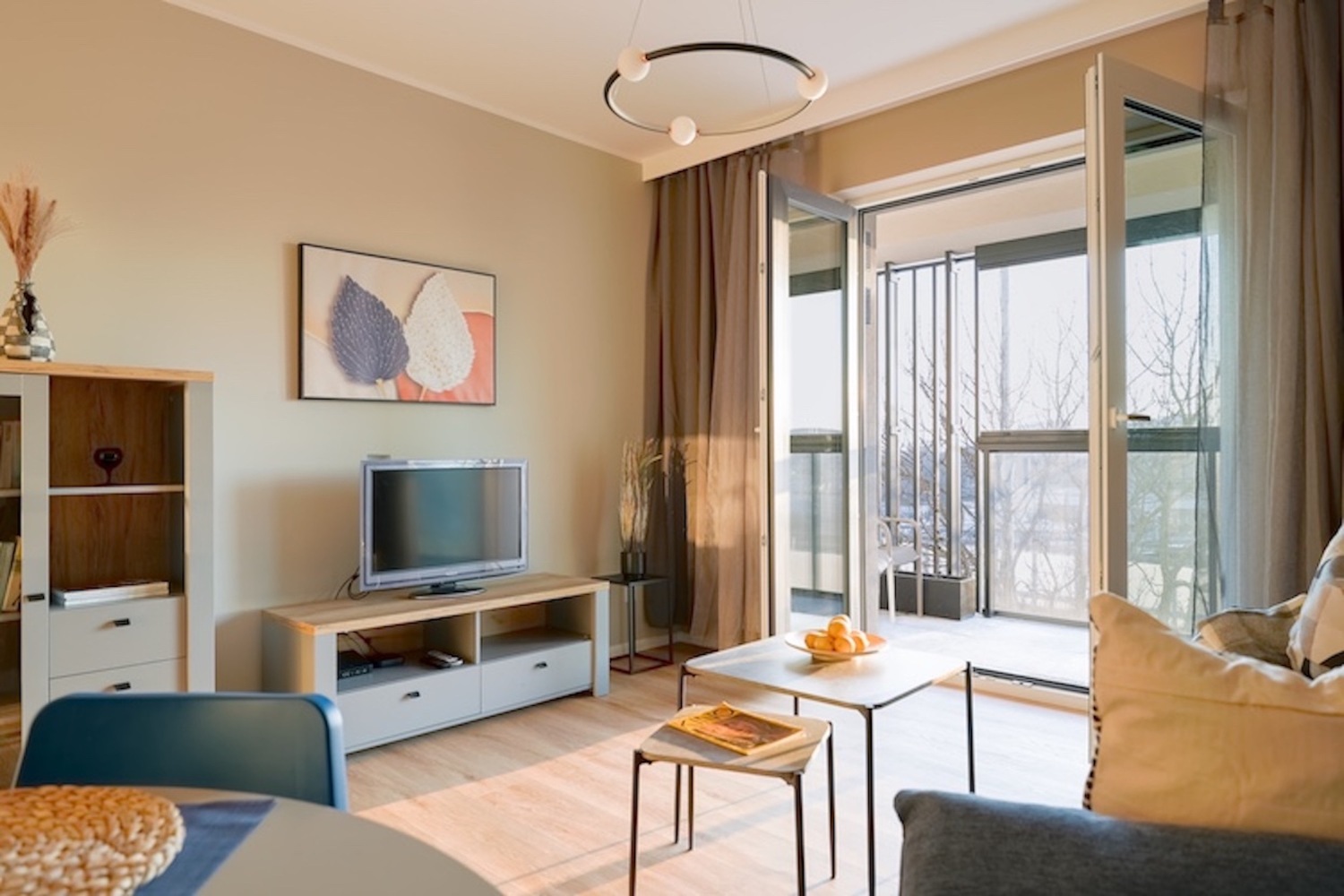 salon z wyjścien na taras łódż mieszkanie na wynajem.jpg