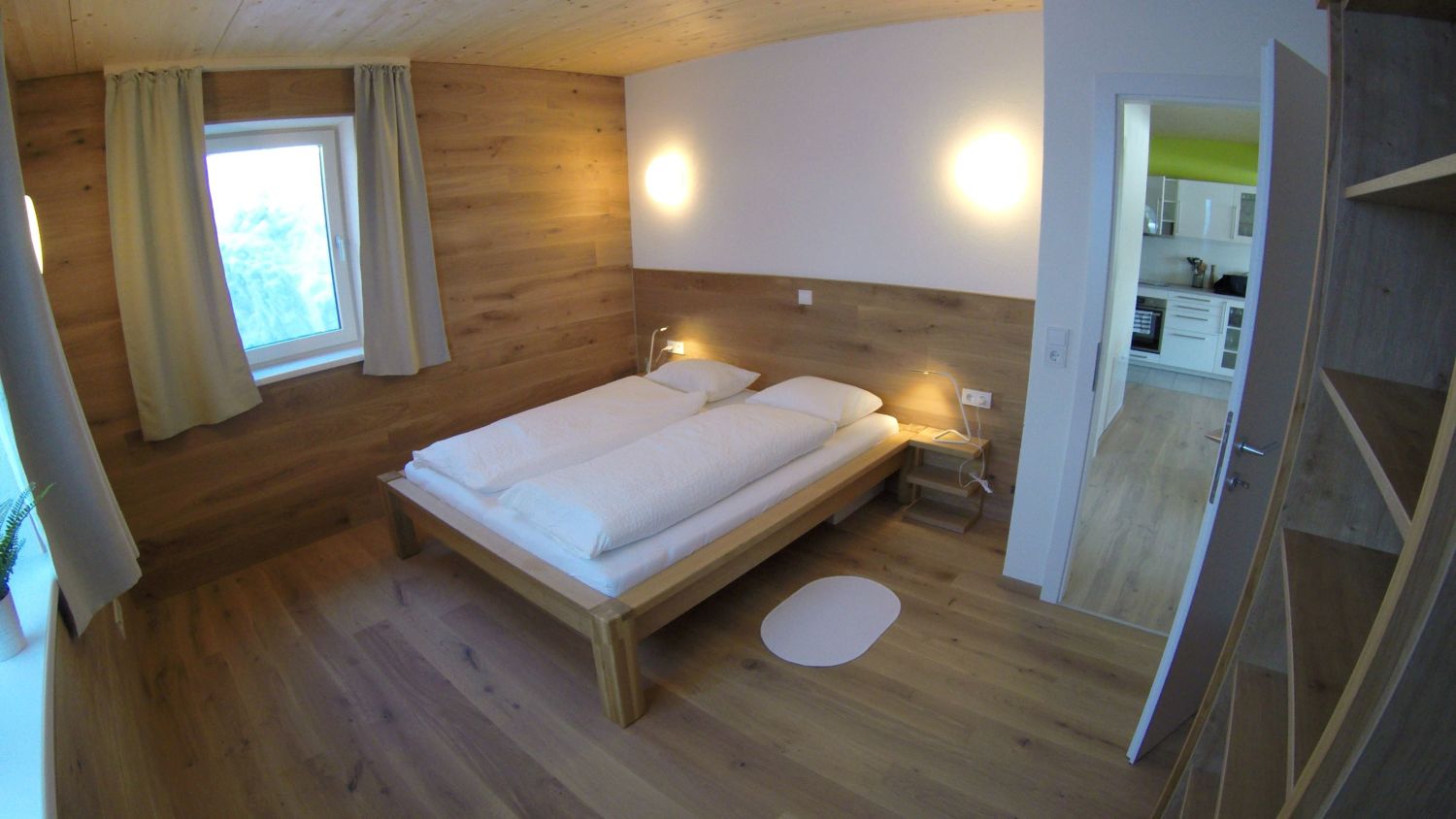 Schlafzimmer 2 Ferienwohnung Mountain View Wood Skigebiet Spital am Pyhrn Wurzeralm.JPG