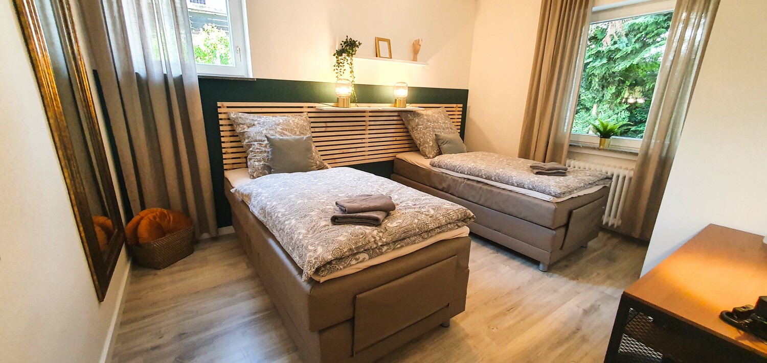 Schlafzimmer_zwei_Bett.jpg