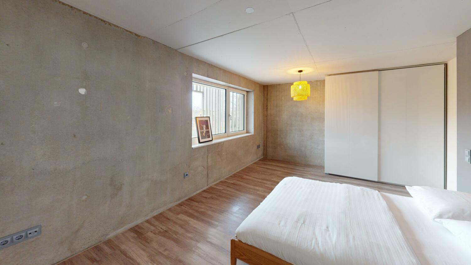 Skyline-Atelier-im-Sichtbeton-Bedroom (2).jpg