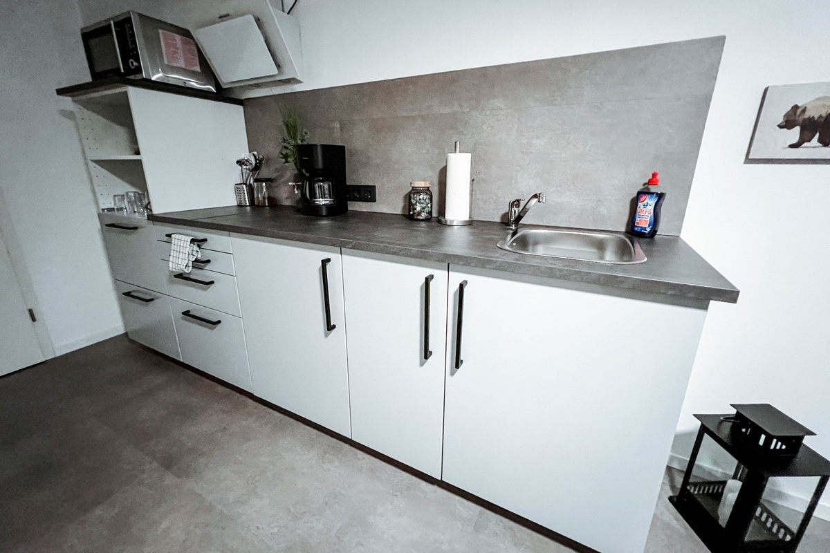 14_Moderner_Kuechenbereich.png