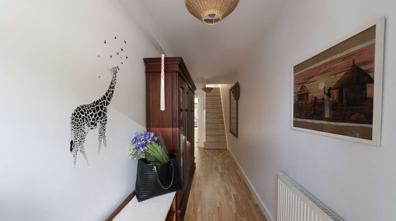 Ground floor front door view down entrance hall.jpg