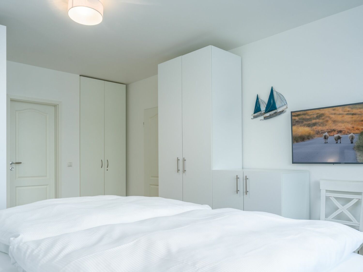 Fewo Westerland_Techt bi Strön_Schlafzimmer 02.jpg